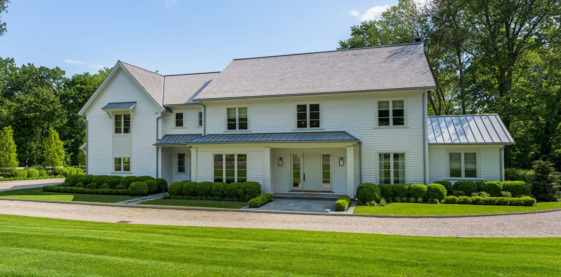 winding lane home in west port front exterior